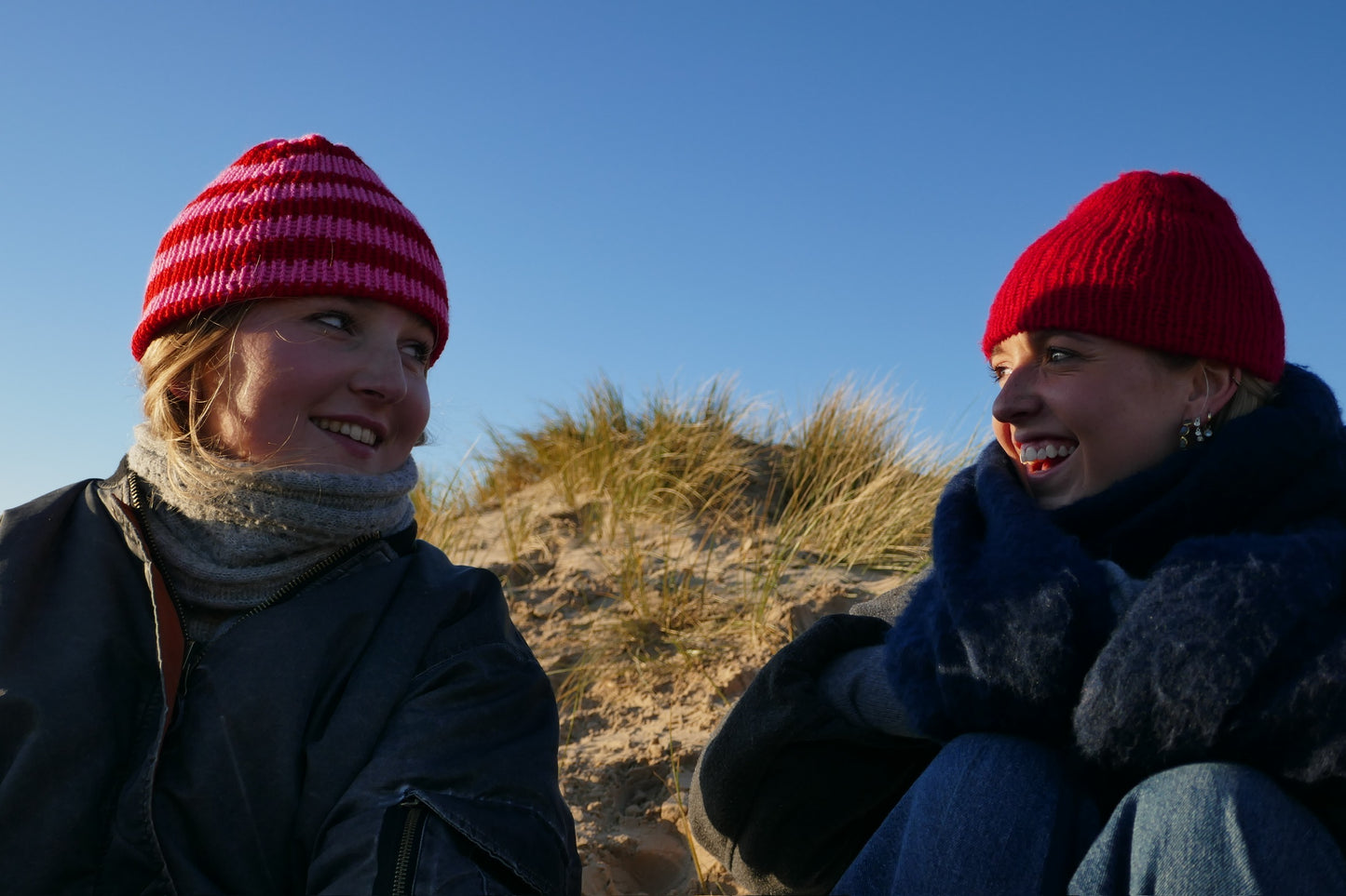 Pink and red striped knitted beanie